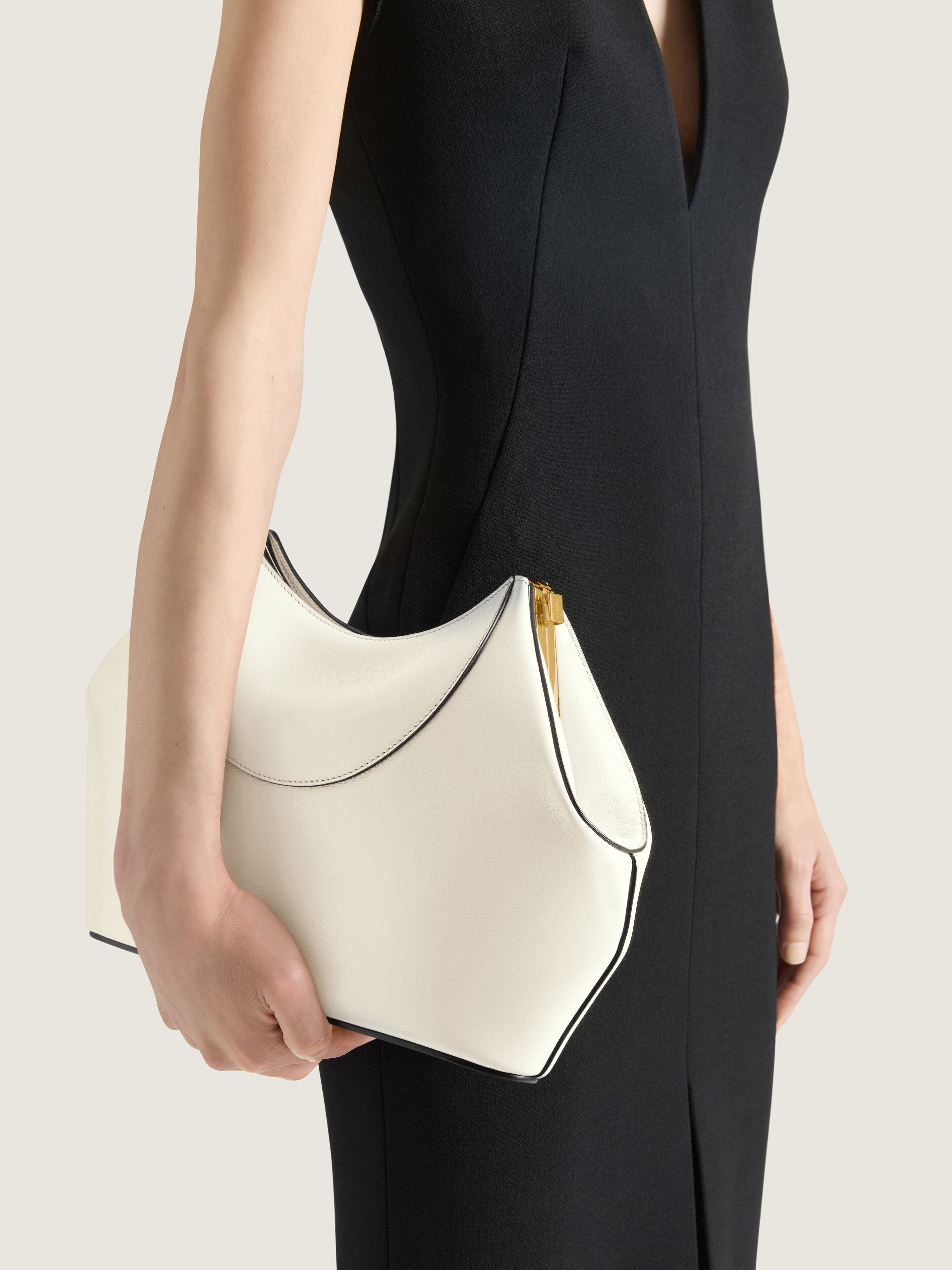 Facet clutch in leather